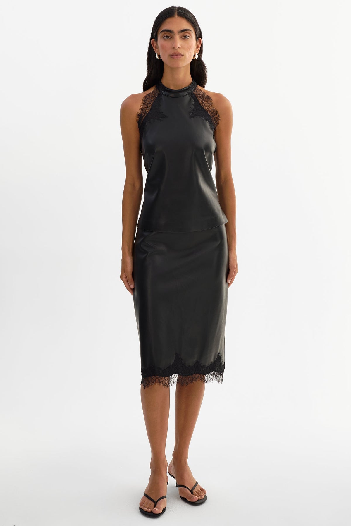 GINNY lace trim faux leather halter top in black — detail view