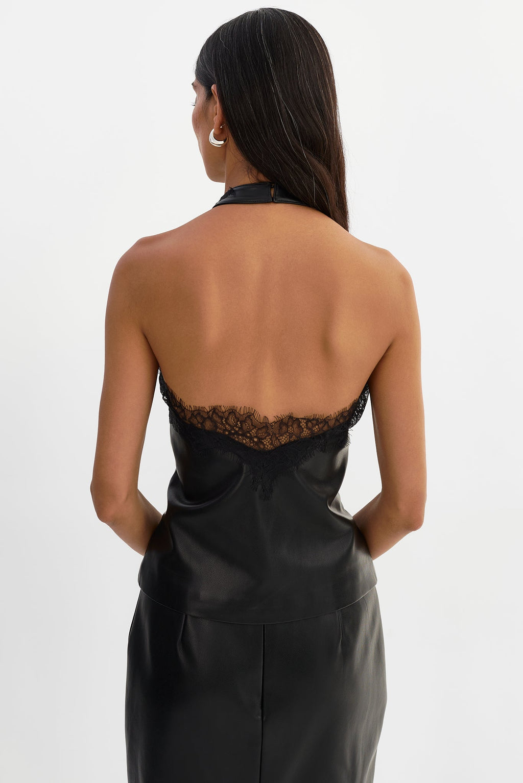 GINNY lace trim faux leather halter top in black — styled view
